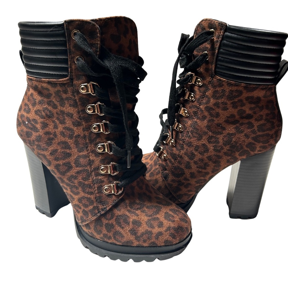 Platform heeled leopard boots